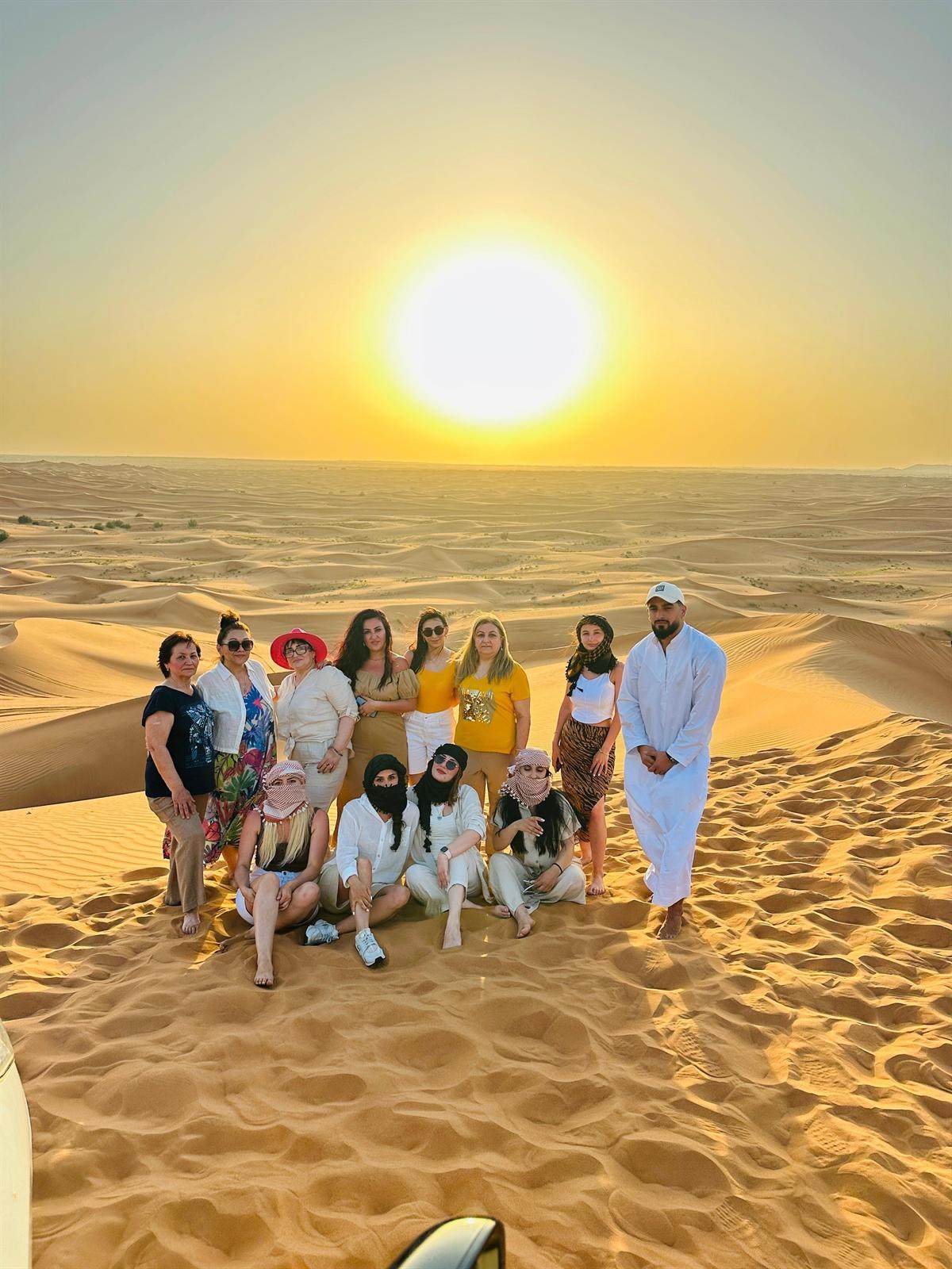 Sunset desert group photo in Dubai
