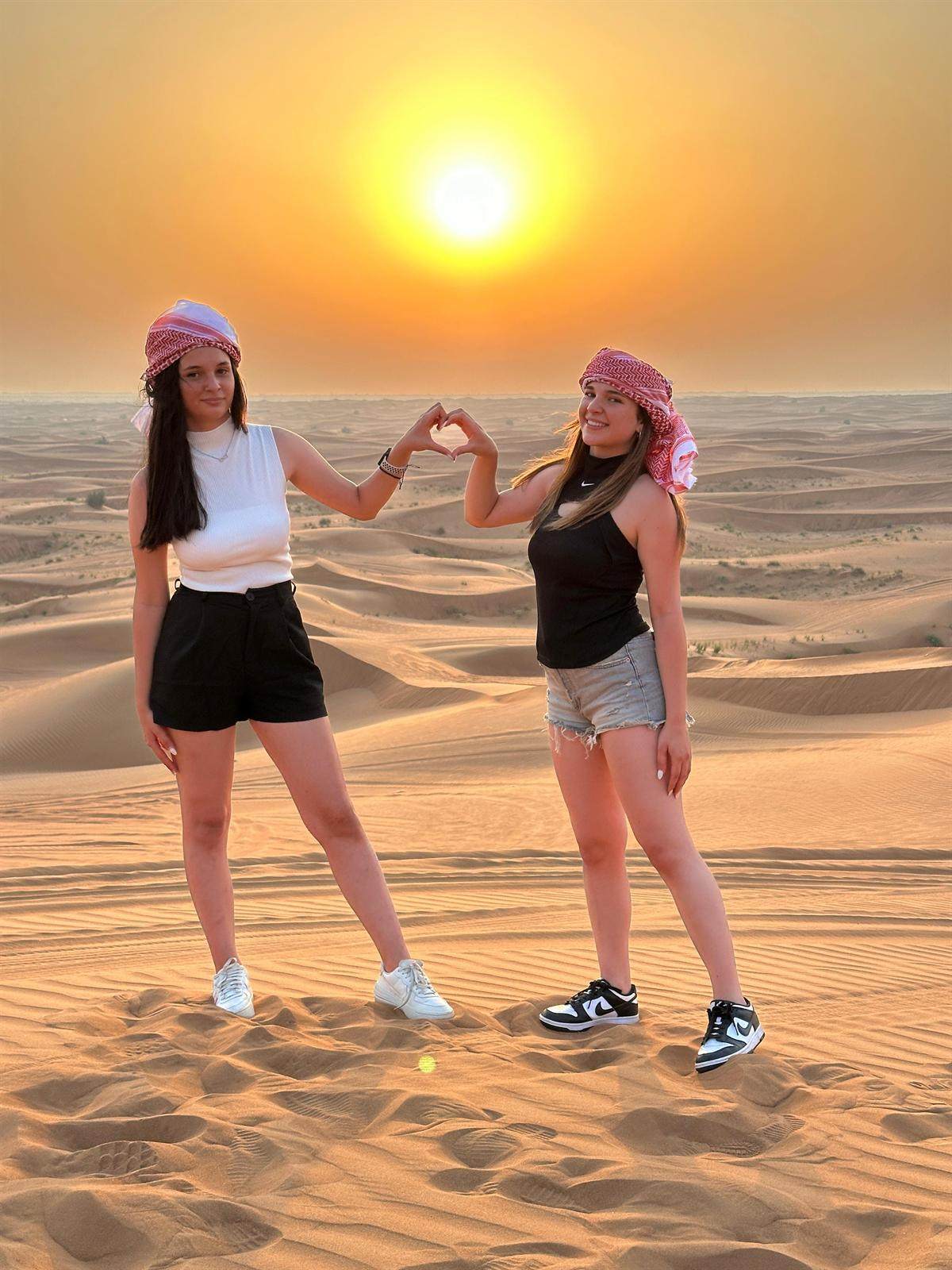 Friends enjoying Dubai desert safari