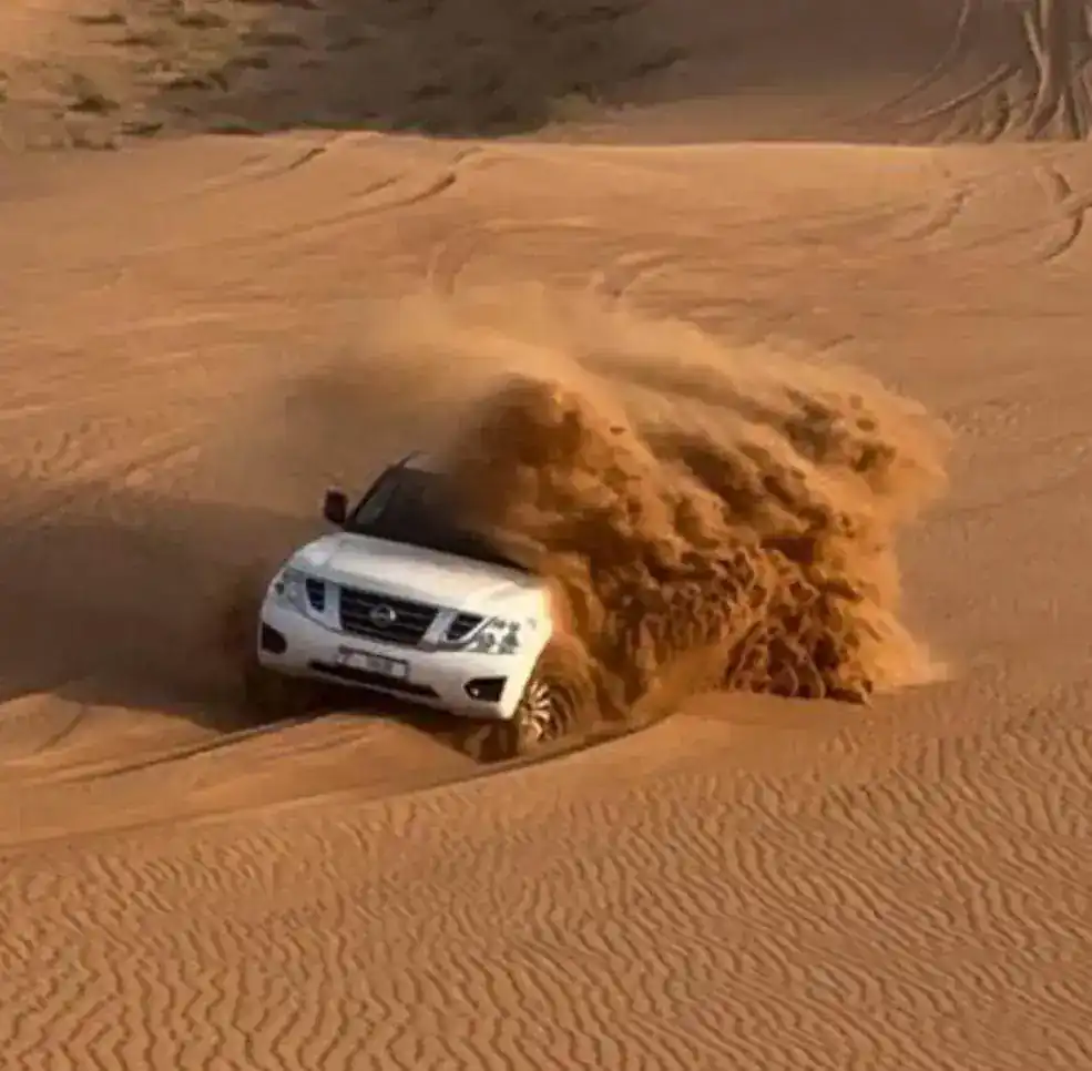 Dune bashing action in Dubai desert