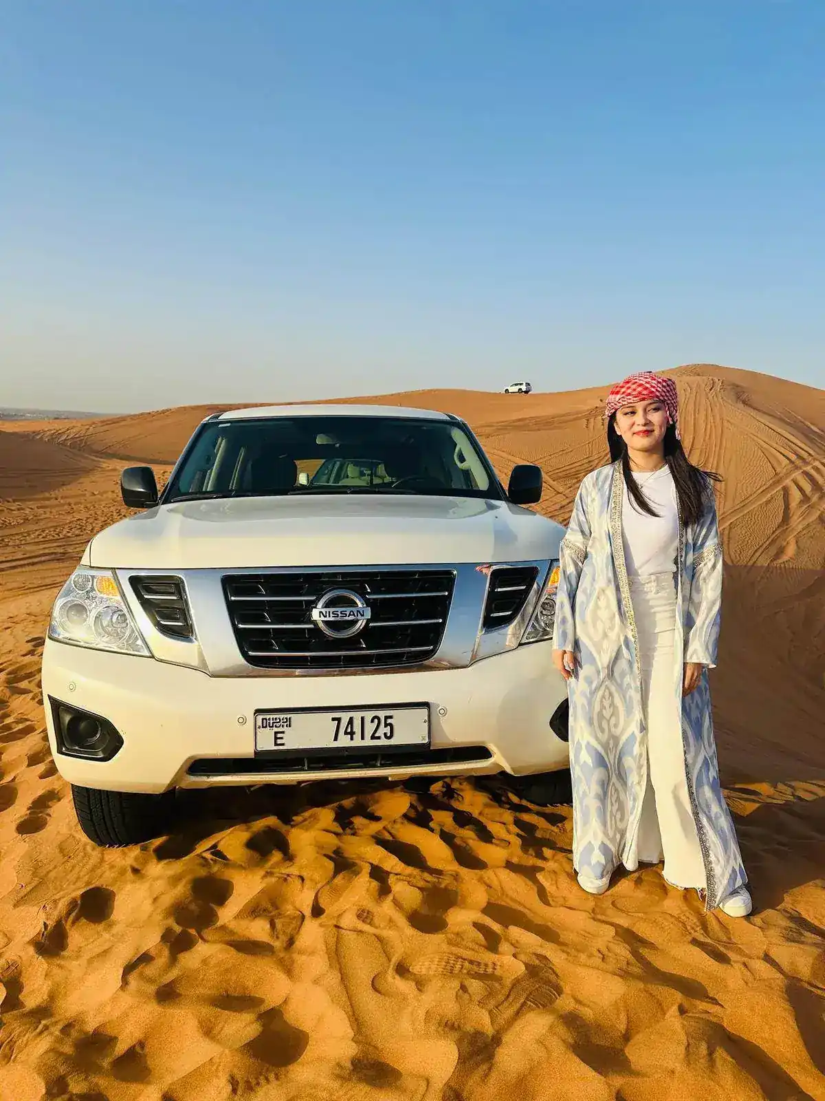 Safari vehicle in Dubai desert dunes